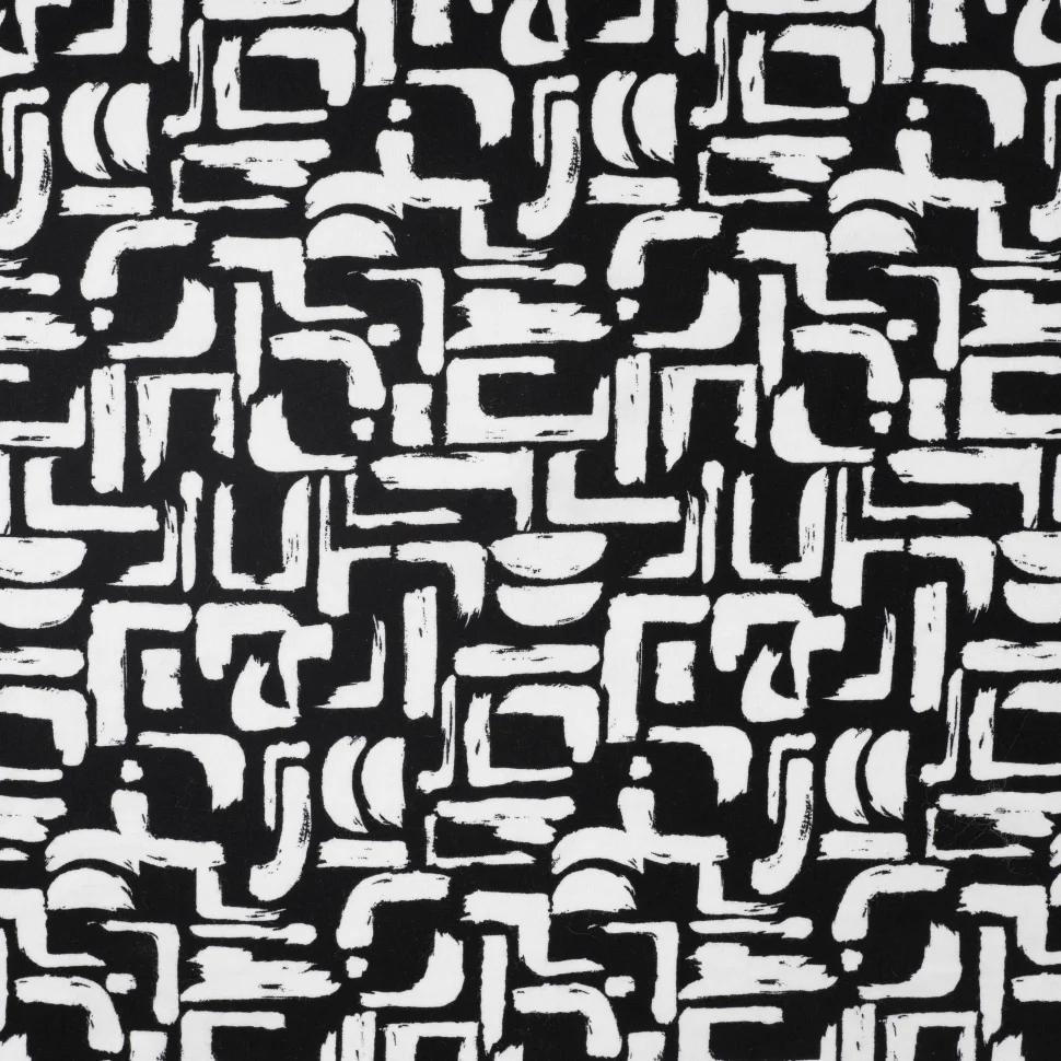 Tissu Jersey Milano motifs blancs sur fond Noir
