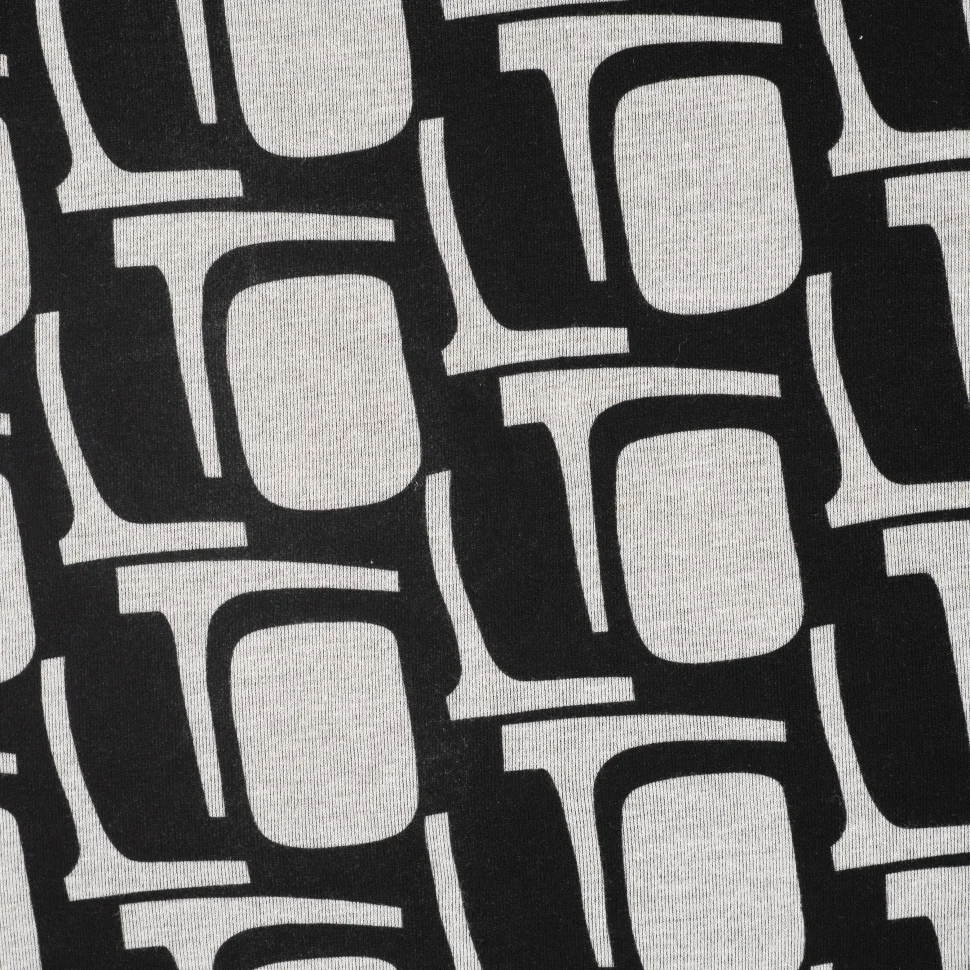 Tissu Jersey Milano Motifs écru sur fond Noir