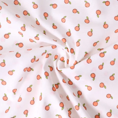 Tissu Popeline de Coton Petites pêches sur fond Blanc