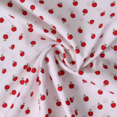 Tissu Popeline de Coton Petites pommes rouges sur fond Blanc