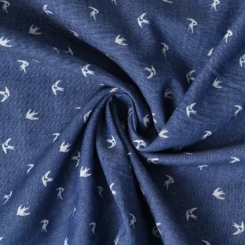 Tissu Chambray de coton Hirondelles sur fond Bleu jean