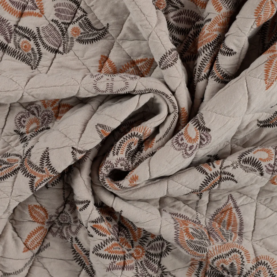Tissu Matelassé réversible fleurs stylisées brodées Terracotta sur fond Grège