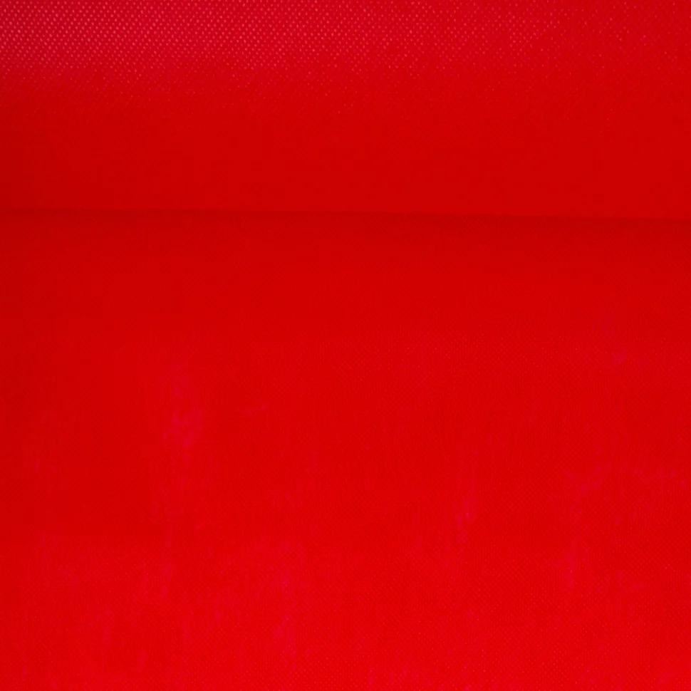 Tissu Fiesta Non tissé déperlant uni Rouge