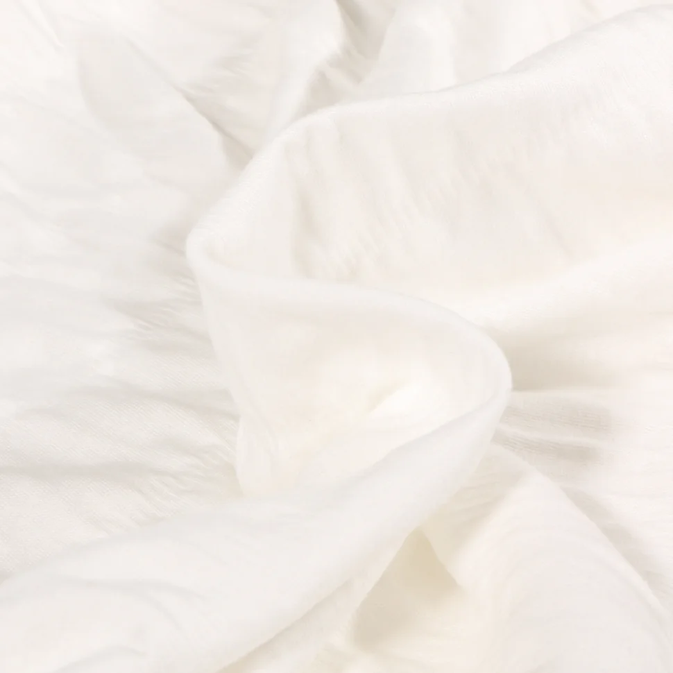 Tissu Jersey Coton smocké uni Ecru