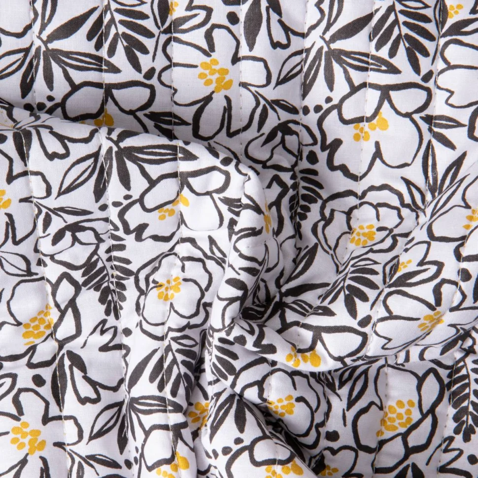 Tissu Coton Matelassé réversible Ray floral Noir et feuillage Jaune sur fond Blanc