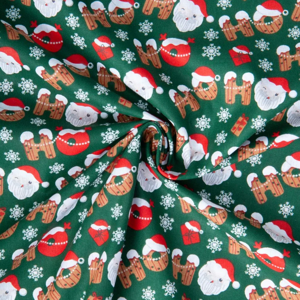 Tissu Coton imprimé Santa herault guirlande Noël sur fond Vert sapin