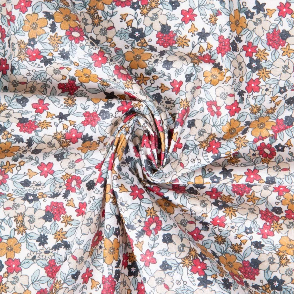 Tissu Coton enduit Agatha fleuris Ocre sur fond Blanc