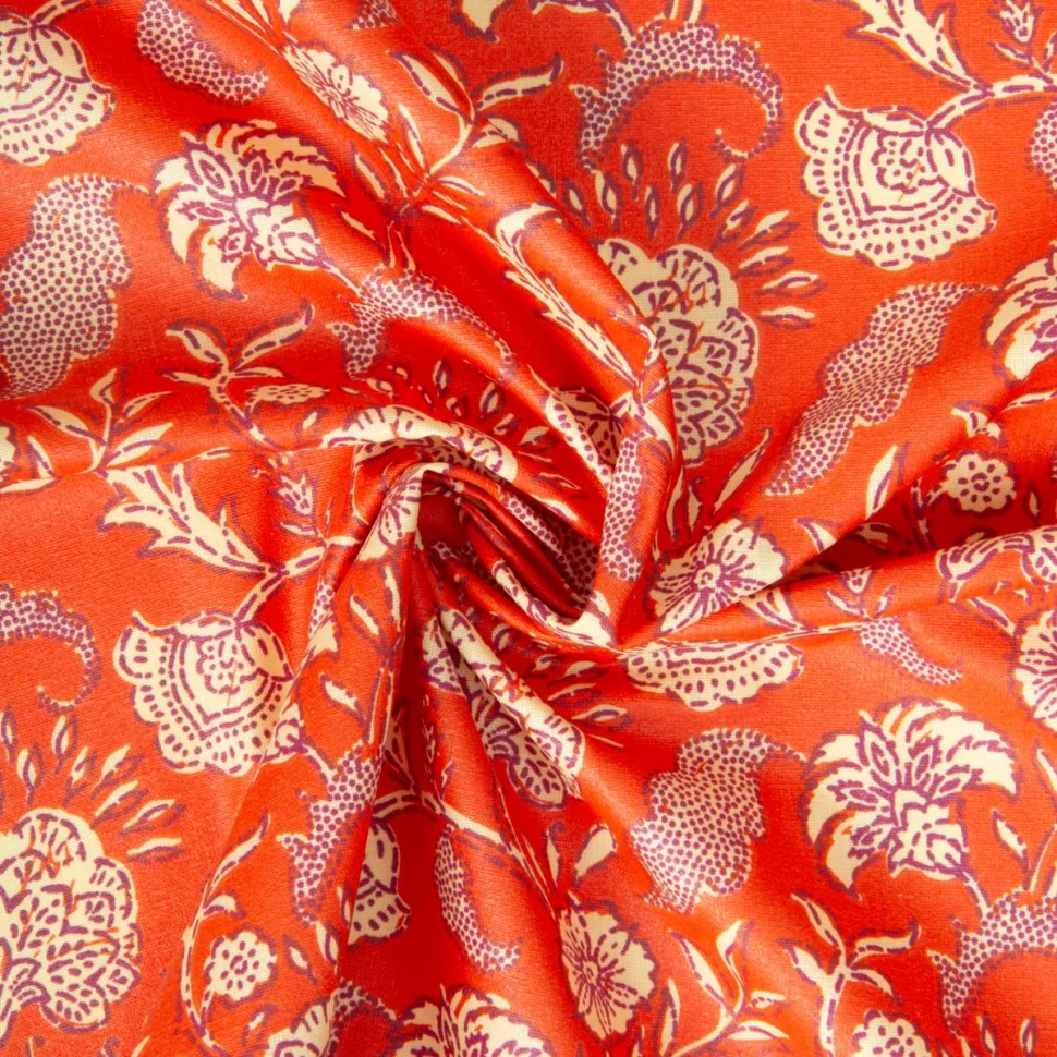 Tissu Coton enduit Agra fleuris sur fond Orange