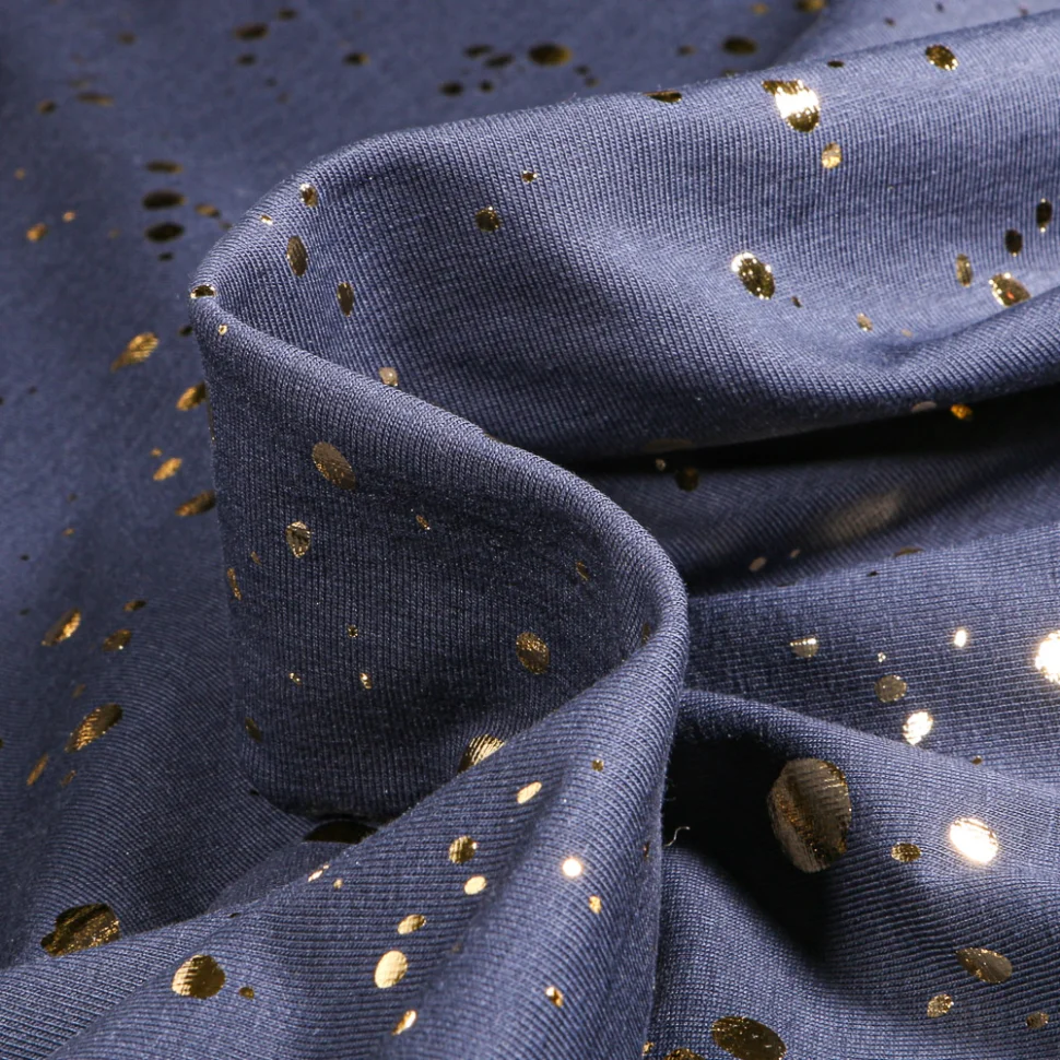 Tissu Jersey Coton Pois métallisés dorés sur fond Bleu nuit