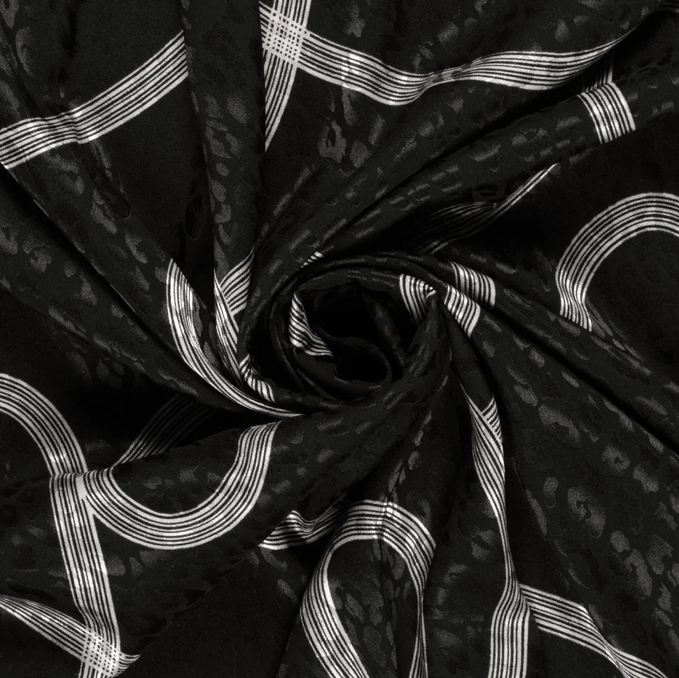 Tissu Satin imprimé Relief léopard sur fond Noir