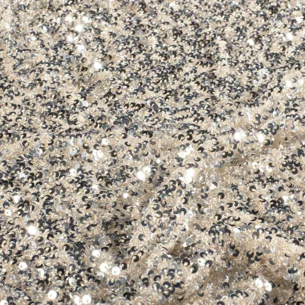 Tissu Sequins Cosmos sequins Argentés sur fond Beige nacré