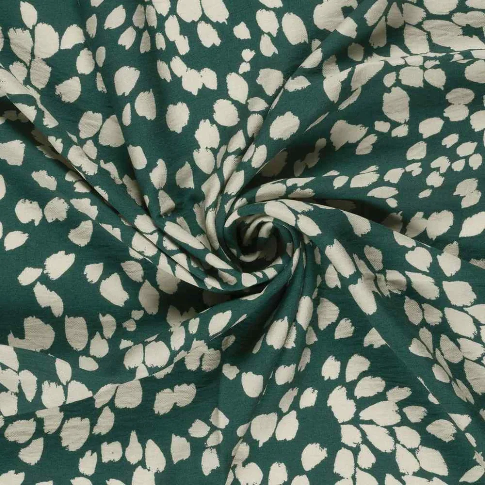 Tissu crêpe de viscose imprimé Fleuris blanc sur fond Vert clair