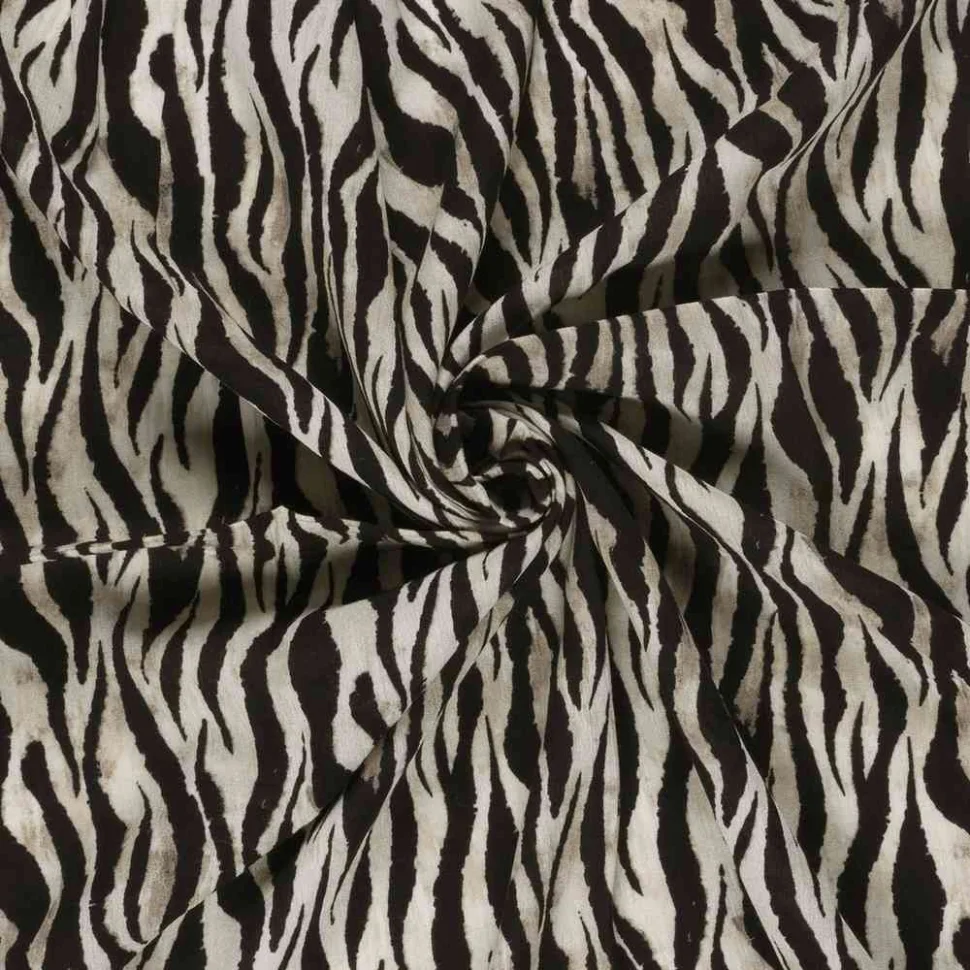 Tissu crêpe de viscose imprimé motif zèbre sur fond Noir