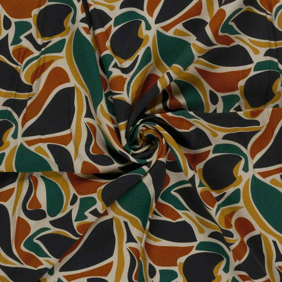 Tissu Viscose sergé imprimé motifs feuilles sur fond Vert