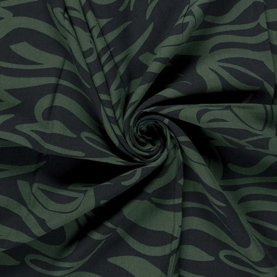 Tissu Viscose twill Pia arabesques sur fond Vert
