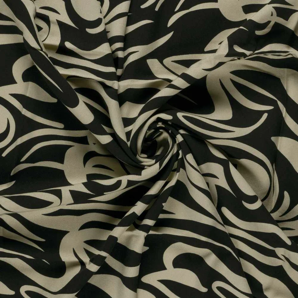 Tissu Viscose twill Pia arabesques sur fond Noir