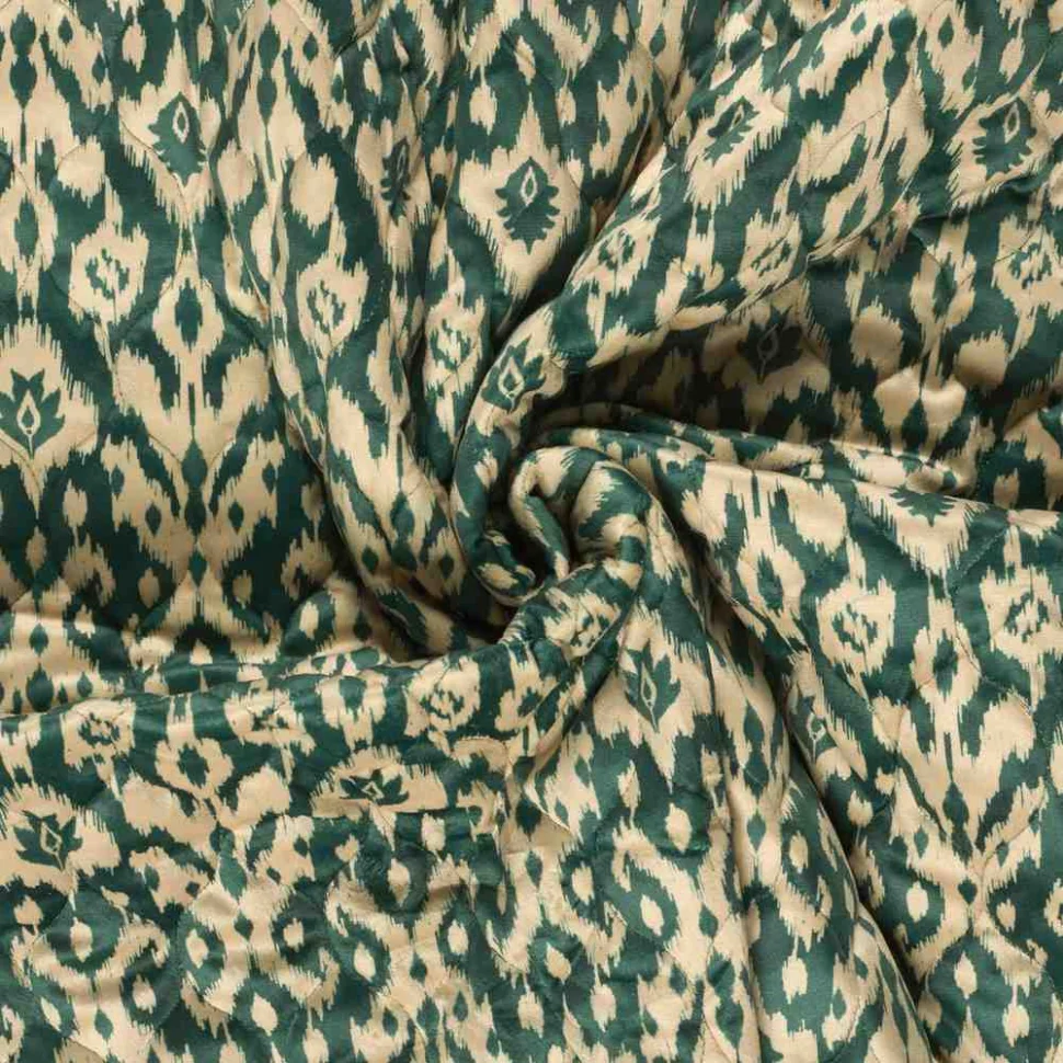 Tissu velours matelassé imprimé envers uni motif ethnique sur fond Vert