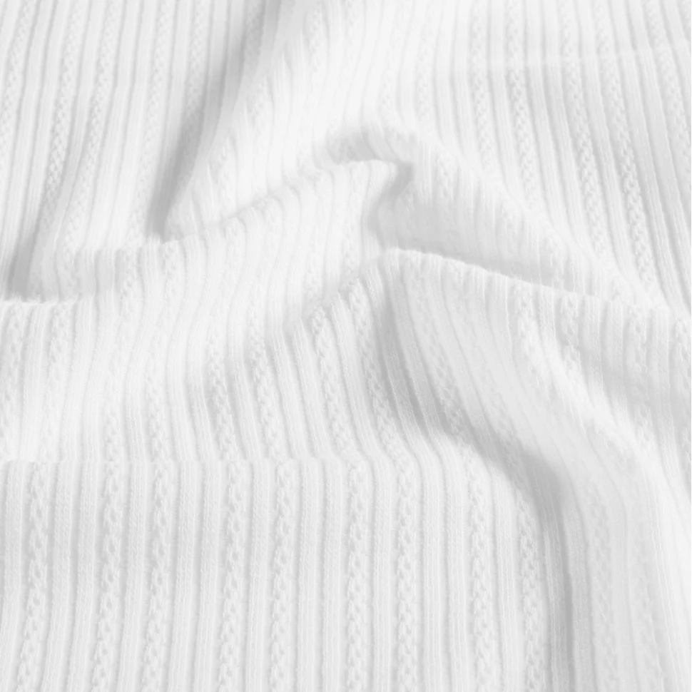 Tissu Maille Bord côte ajouré Chenille Torsadé sur fond Blanc