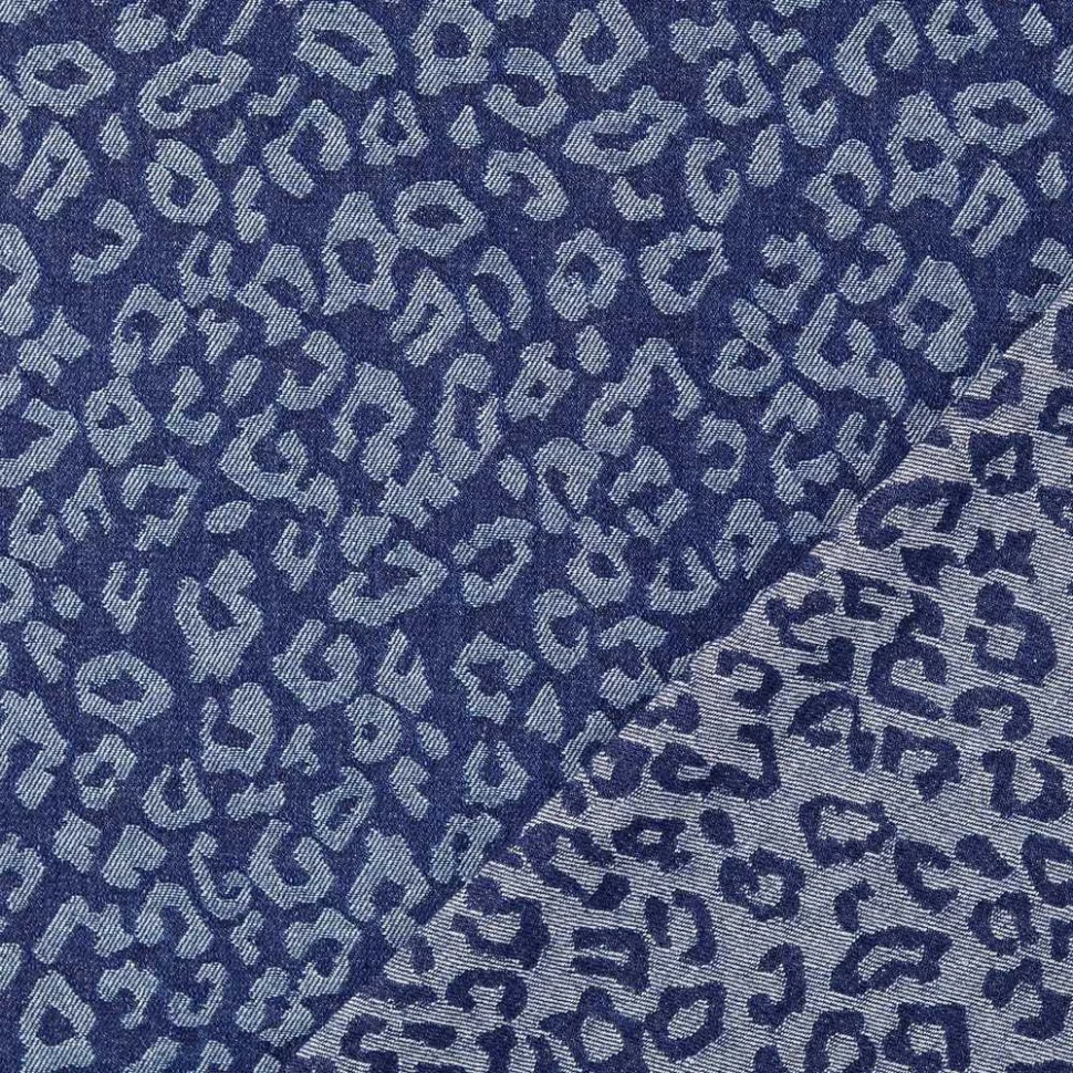 Tissu Jean Jacquard motif léopard Blanc sur fond Bleu denim