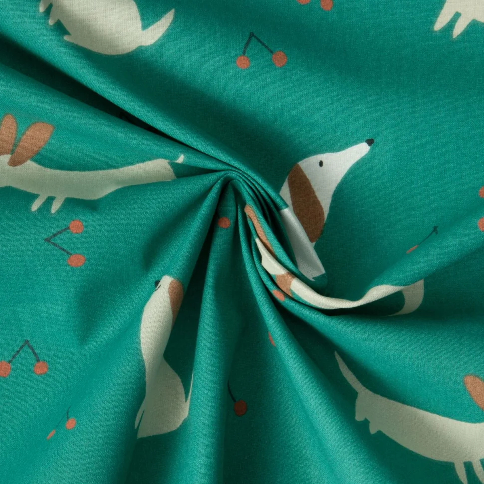 Tissu Coton imprimé Dowe chiens et cerises sur fond Vert foncé