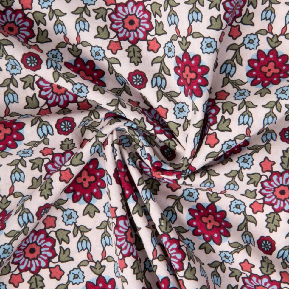 Tissu Coton imprimé Arty Kumba fleuris bordeaux sur fond Rose pâle