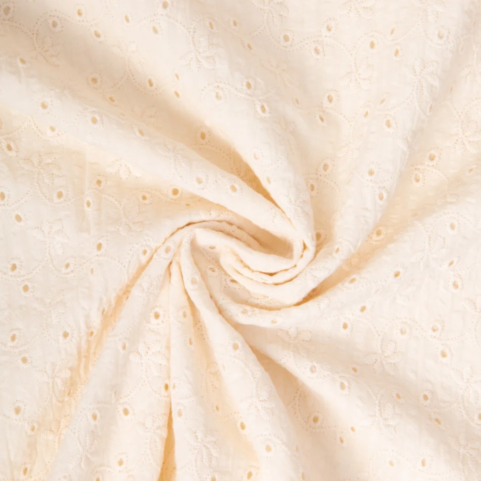 Tissu Seersucker Coton ajouré Fleurs brodées sur fond Ecru