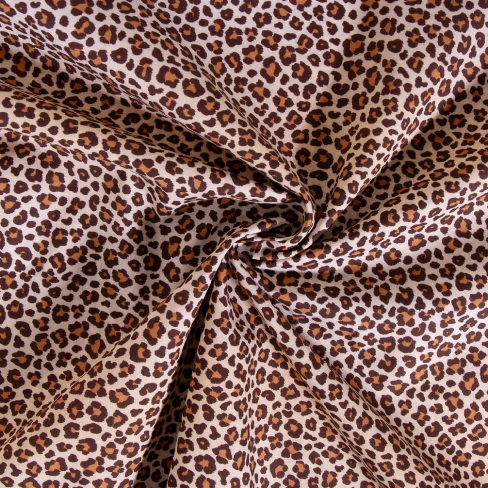 Tissu Popeline de Coton Léopard sur fond Ecru