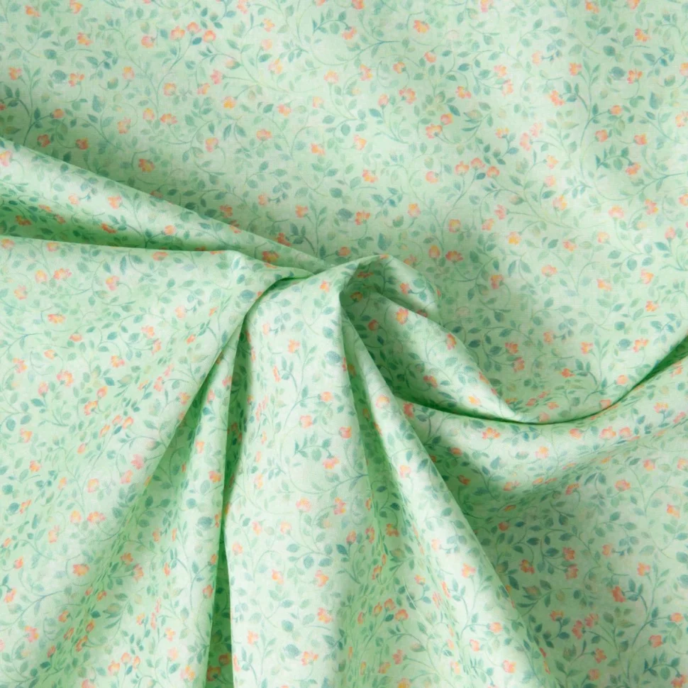 Tissu Popeline de Coton légère Fleur vert moyen et rose pêche sur fond Vert menthe clair
